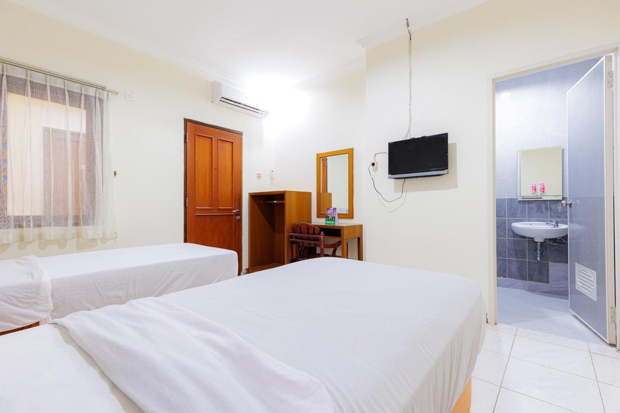 Urbanview Mitra Near Grand Indonesia Hotel